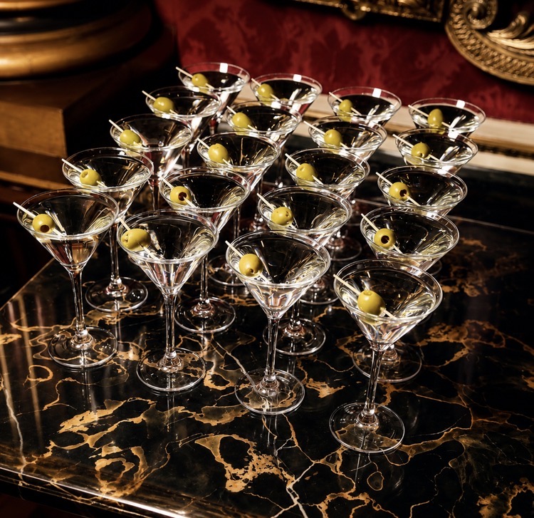 Martini cocktails with olives ready for a drinks reception