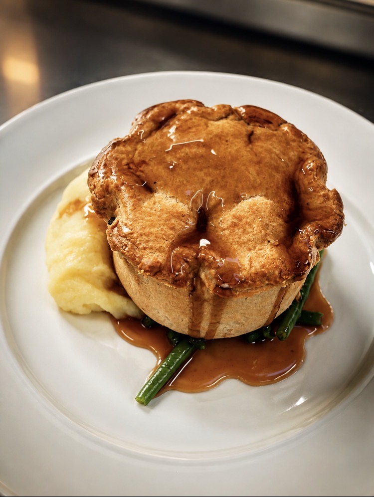 Golden shortcrust pie with buttered mash, green beans and rich gravy