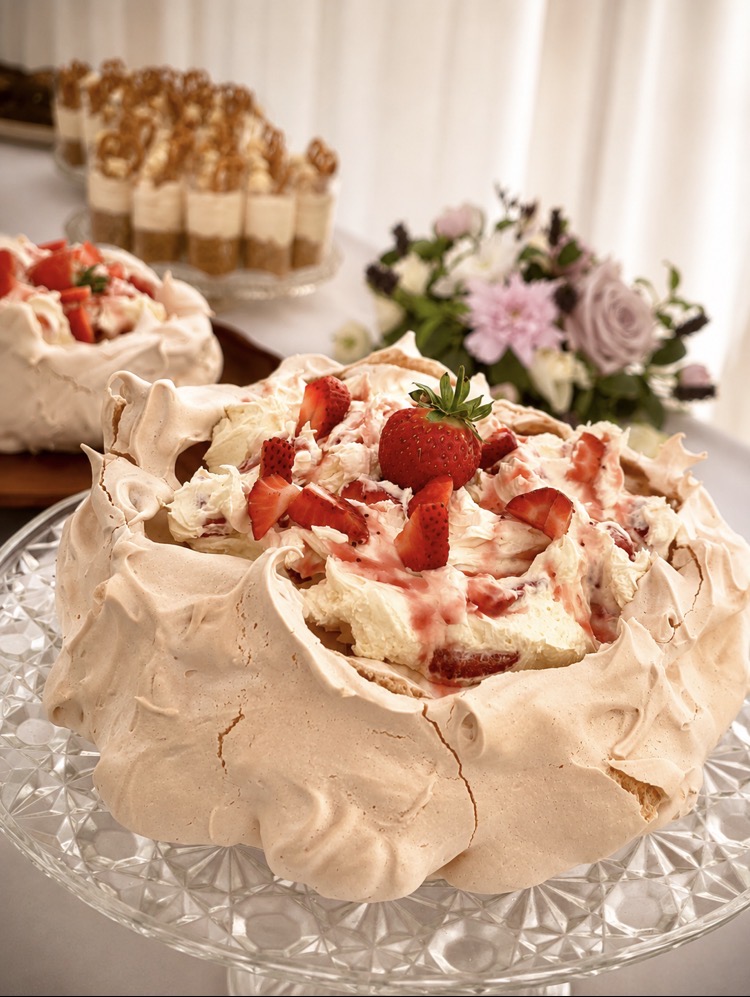 Strawberry pavlova dessert table prepared by Rudd Catering for a Norfolk event