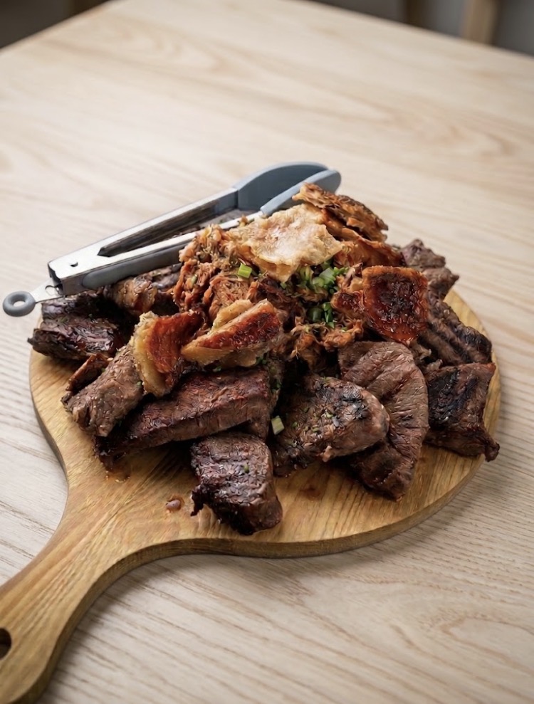 Sharing board of grilled beef and pulled pork for a wedding buffet in Norfolk