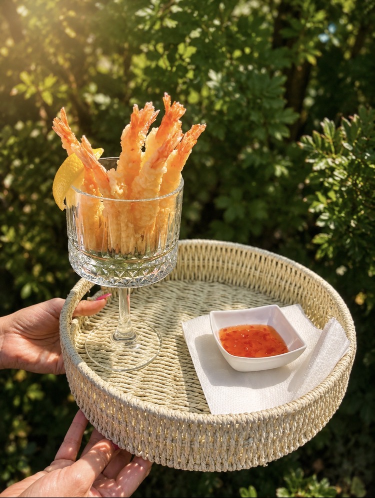 Crispy prawn tempura served in a cut-glass bowl with sweet chilli dipping sauce